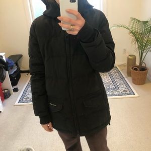Worn black Canada goose winter jacket
